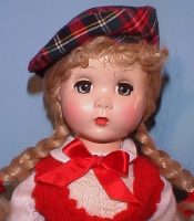 Blonde doll with plaid beret
