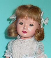 Classic doll with ribbon bows