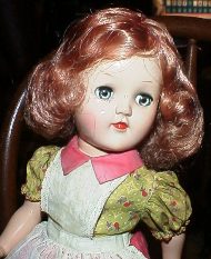Vintage doll with curly hair