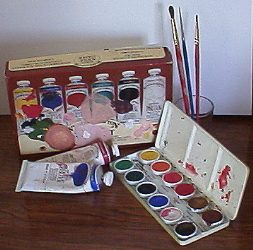 Art supplies on wooden surface