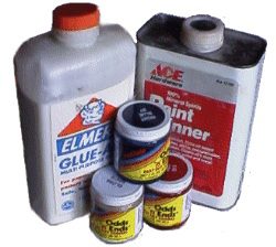 Various containers of glue and paint